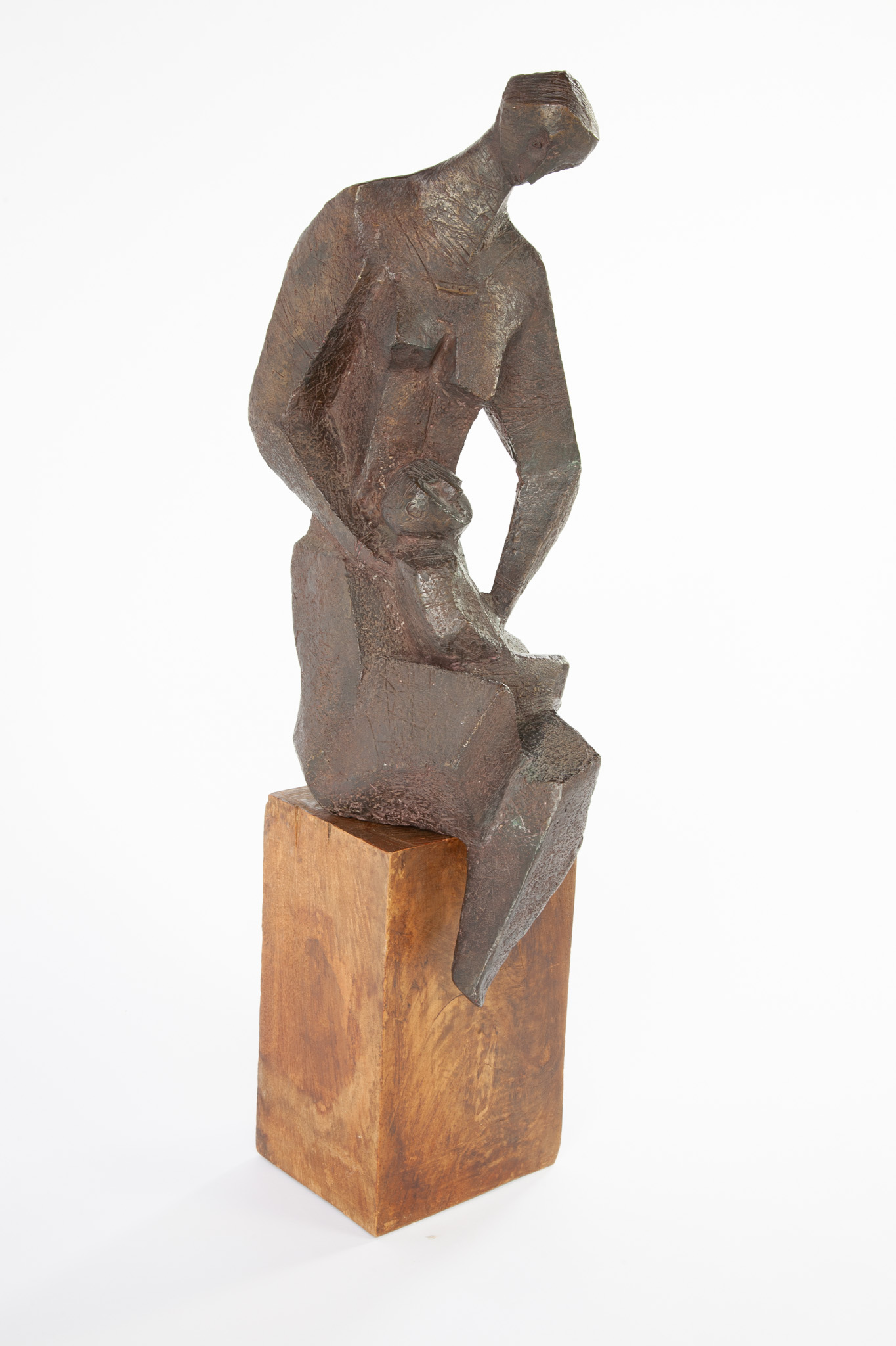 A bronze figure of a mother and child